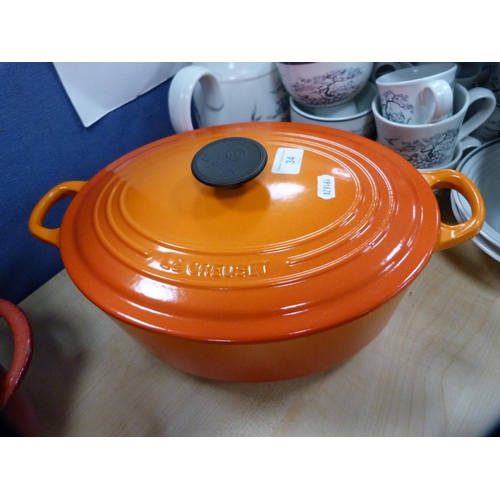 34 - Three Le Creuset casseroles.