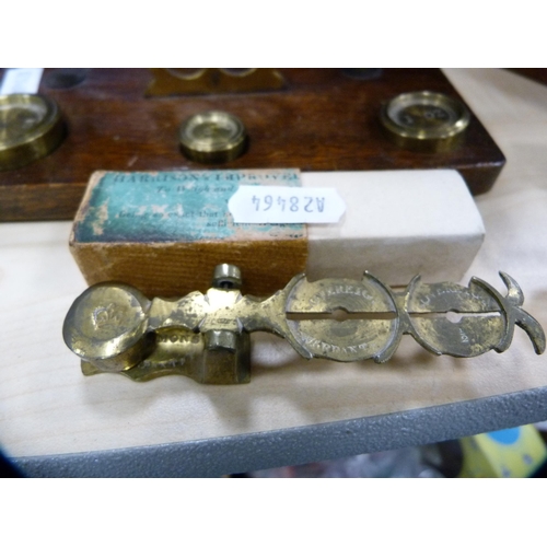 35 - Two sets of postal scales and a pair of wooden bookends.