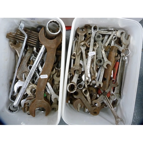 362 - Two tubs containing tools to include spanners, wrenches etc.