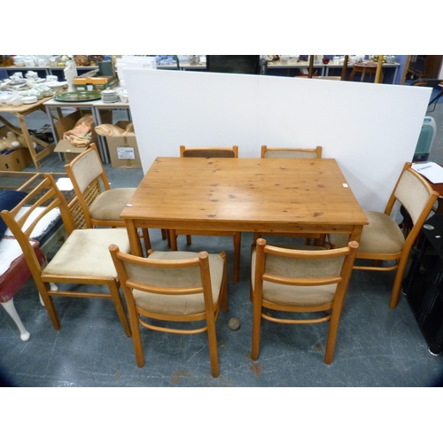 376 - Modern pine table, six matching chairs and a ladder-back chair.  (8)