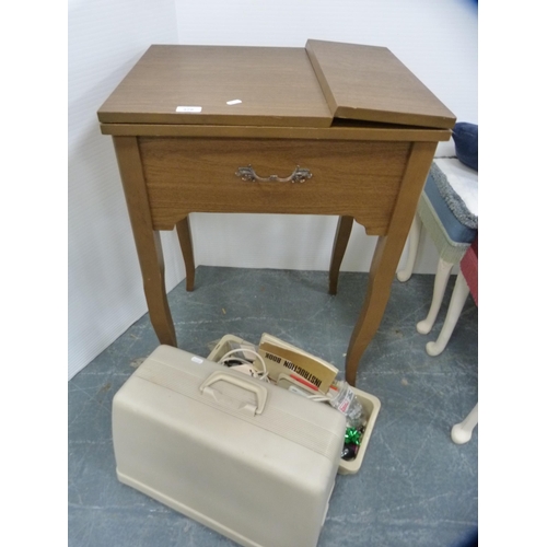 378 - New Home table sewing machine with case.