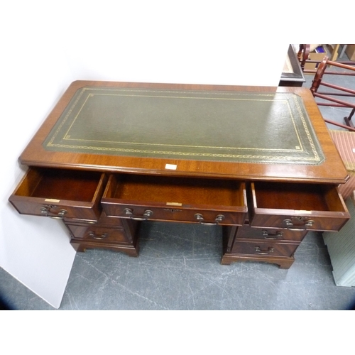 380 - Reproduction kneehole mahogany desk with tooled leather skiver.