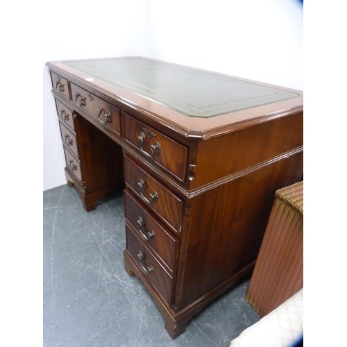 380 - Reproduction kneehole mahogany desk with tooled leather skiver.