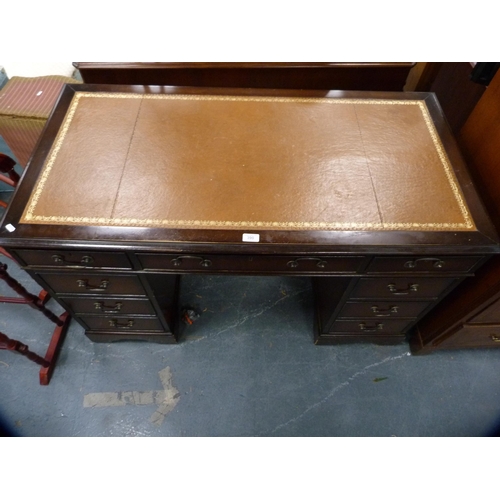 390 - Reproduction mahogany kneehole desk with tooled leather skiver.