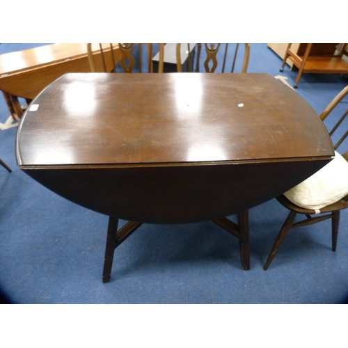 406 - Ercol drop-leaf dining table and a set of four wheel-back spindle chairs.  (5)