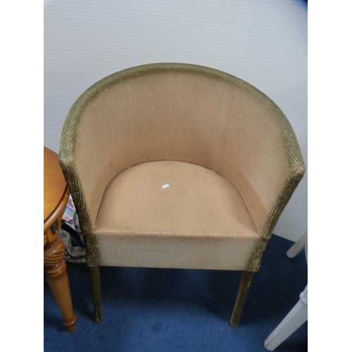 414 - Two woven fibre tub chairs and a modern oval occasional table.  (3)