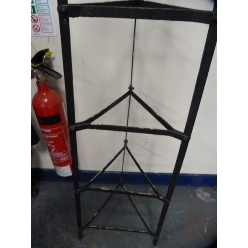 436 - Triangular metal stand.