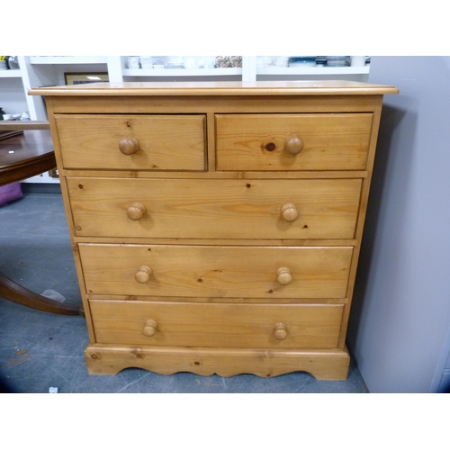 437 - Pine chest of two short and three long drawers.