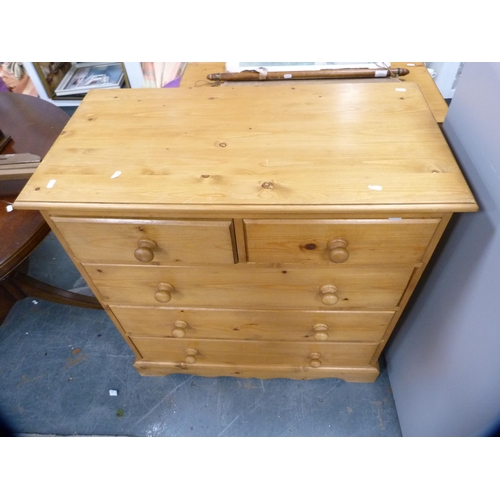 437 - Pine chest of two short and three long drawers.