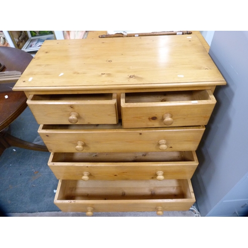 437 - Pine chest of two short and three long drawers.