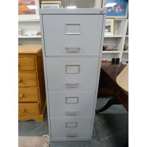 438 - Four-drawer metal filing cabinet.