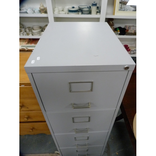 438 - Four-drawer metal filing cabinet.