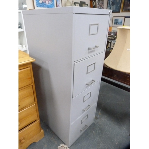 438 - Four-drawer metal filing cabinet.