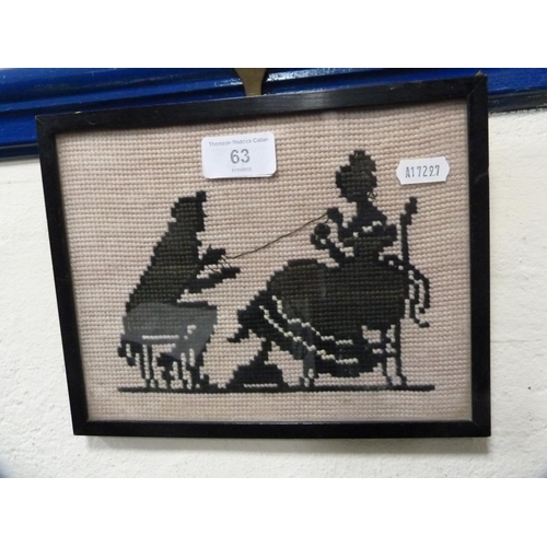 63 - Regency-style silhouette embroidery of a couple, in black slip frame.