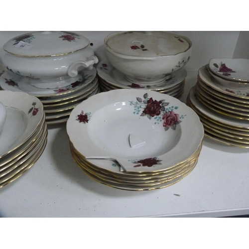 84 - Floral decorated part dinner set (one shelf).