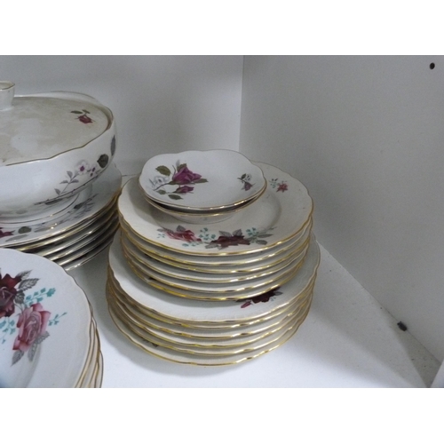 84 - Floral decorated part dinner set (one shelf).