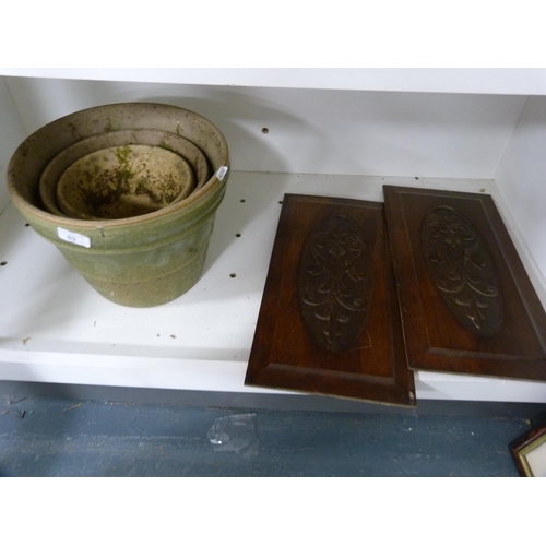 89 - Three graduated plant pots and a pair of carved wooden panels (one shelf).