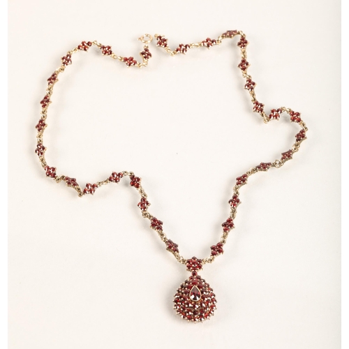 103 - Ladies Victorian garnet necklace, central teardrop garnet surrounded by a cluster of garnets in tear... 