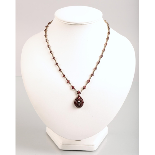 103 - Ladies Victorian garnet necklace, central teardrop garnet surrounded by a cluster of garnets in tear... 