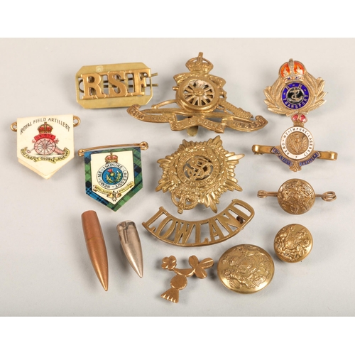 114 - Assorted military badges