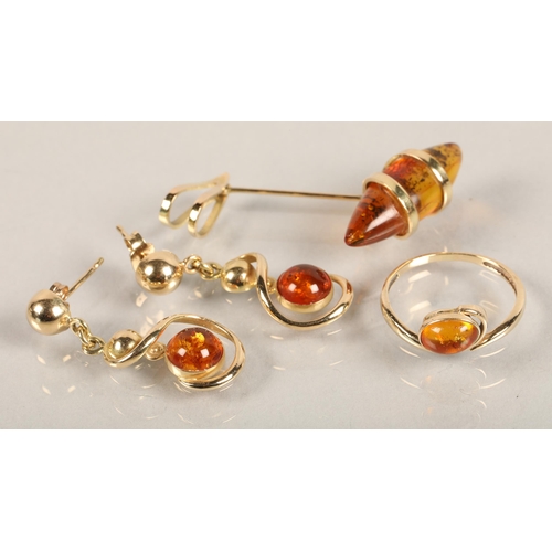 122 - Gold amber resin set pendant, earrings, and ring