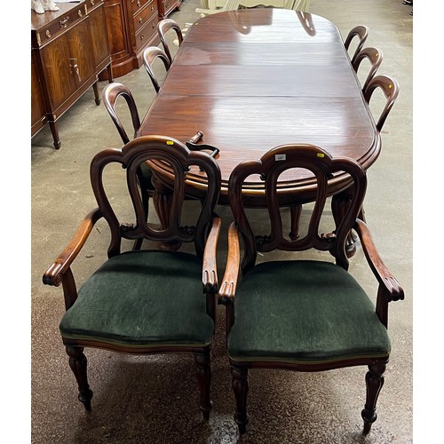 605 - 20th century mahogany telescopic table & 8 chairs table length with leaves 288 cm