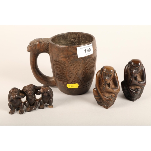 190 - Carved wooden monkey figures and carved wooden mug (4)