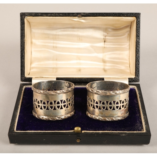 208 - Cased set of two silver napkin rings.