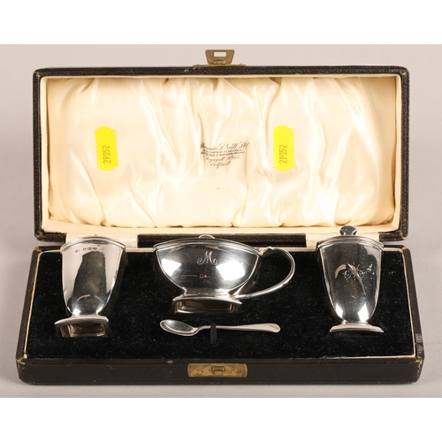 211 - Cased silver cruet set (3). Birmingham 1932138 grams