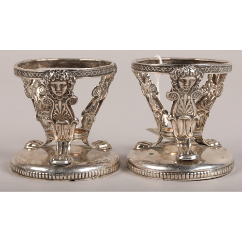 212 - Pair of silver egg cups.