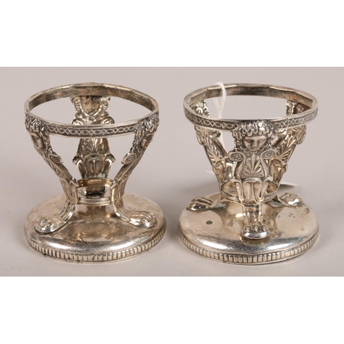 212 - Pair of silver egg cups.