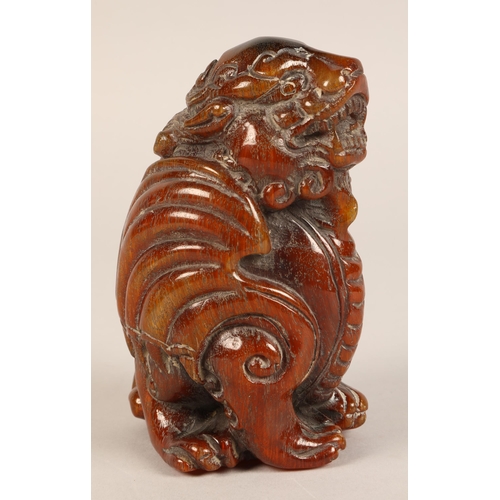 234 - Carved resin oriental lion foo dog figure