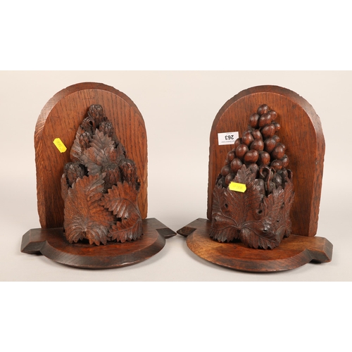 263 - Pair of carved oak wall sconces with grape ornament, 28cm. (2)