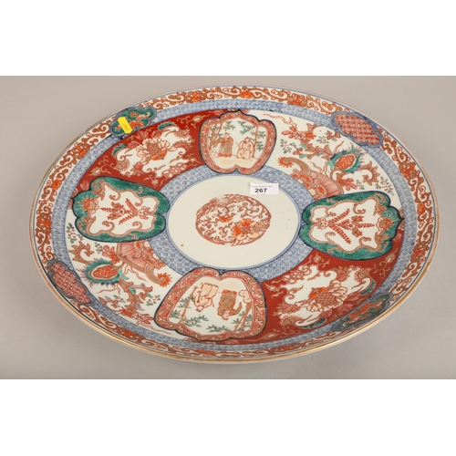 267 - Late 19th century Imari charger, decorated with figures and foilage, 47cm.