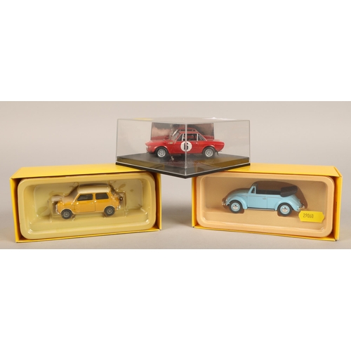 283 - Skid Lancia rally car, Llado model of a Mini and VW Beetle.