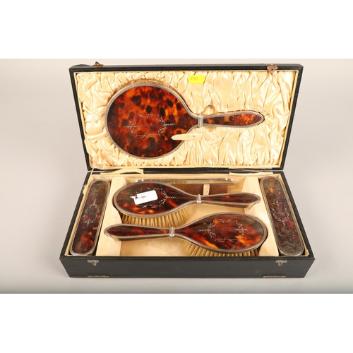 301 - Silver mounted and Tortoishell dressing table set in fitted box