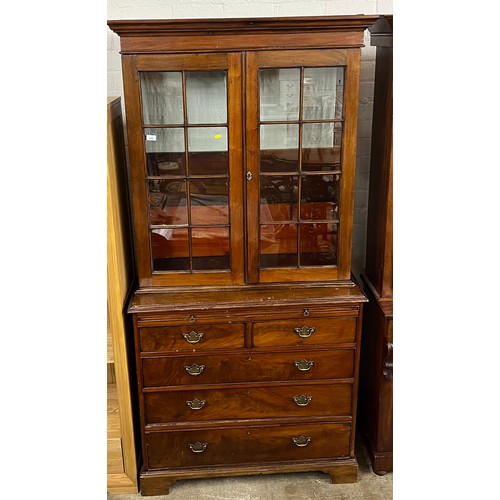 609 - Mahogany glazed bookcase over chest