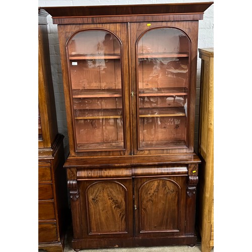 611 - Victorian mahogany bookcase over cupboard