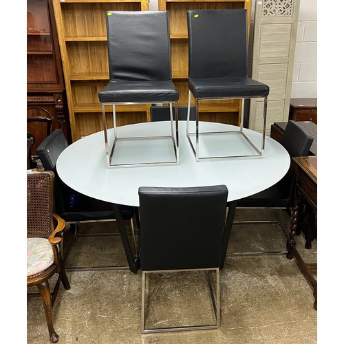 613 - Contemporary glass dining table with six upholstered chrome chairs