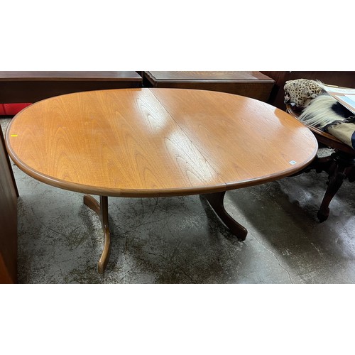 620 - Teak extending oval dining table