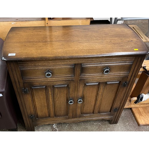 664 - Oak sideboard with two fitted drawers