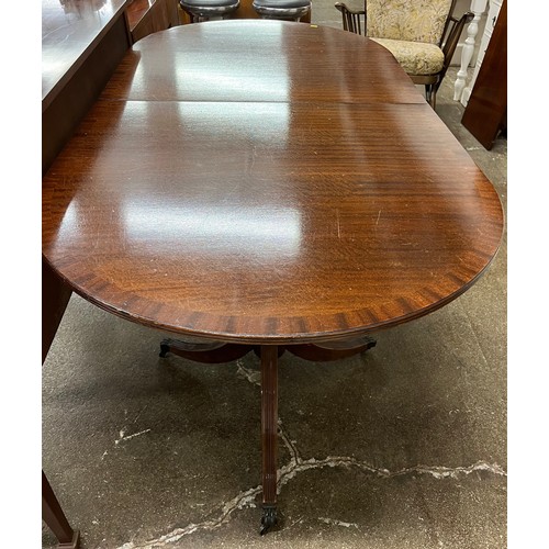 668 - Mahogany sideboard & regency style dining table