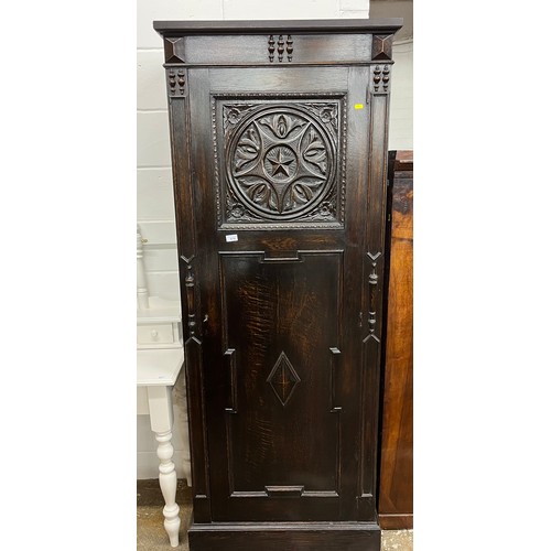 670 - Dark stained oak hall cabinet with carved detailing