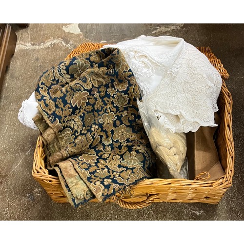 696 - Assorted vintage textiles in wicker basket