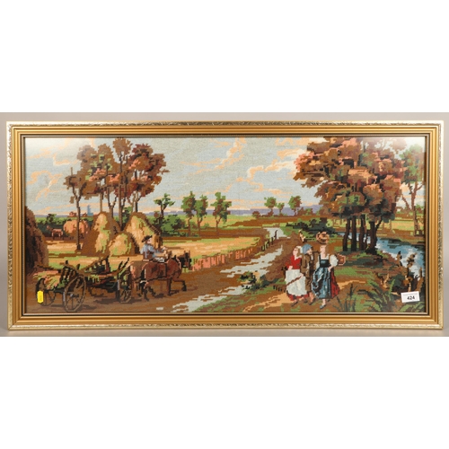 424 - Framed woolwork of a pastoral scene, 95 x 45 cm including frame