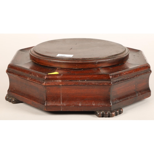 566 - Mahogany octagonal  stand, 11cm high