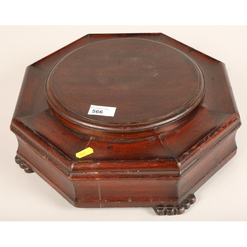 566 - Mahogany octagonal  stand, 11cm high