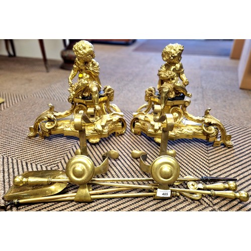 405 - Pair of brass fire place ends with cherubs, brass companion set and fire dogs