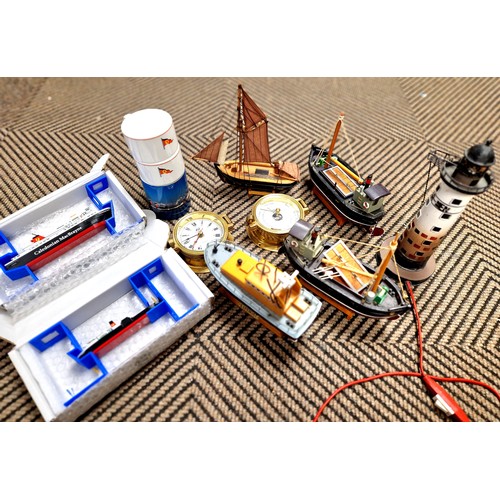 391 - Assortment of model boats, Cal mac lego boat, light house lamp, Waverely related items