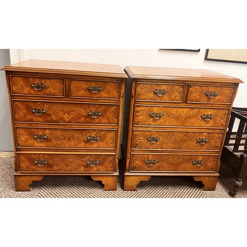 569 - Pair of walnut chest of two over three drawers, 61 x 38 x 75 cm (2)